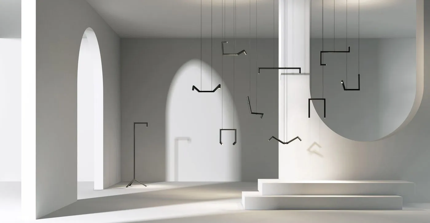 Adam Goodrum kinks aluminium rods into the Hangman lights for Rakumba, image via Dezeen