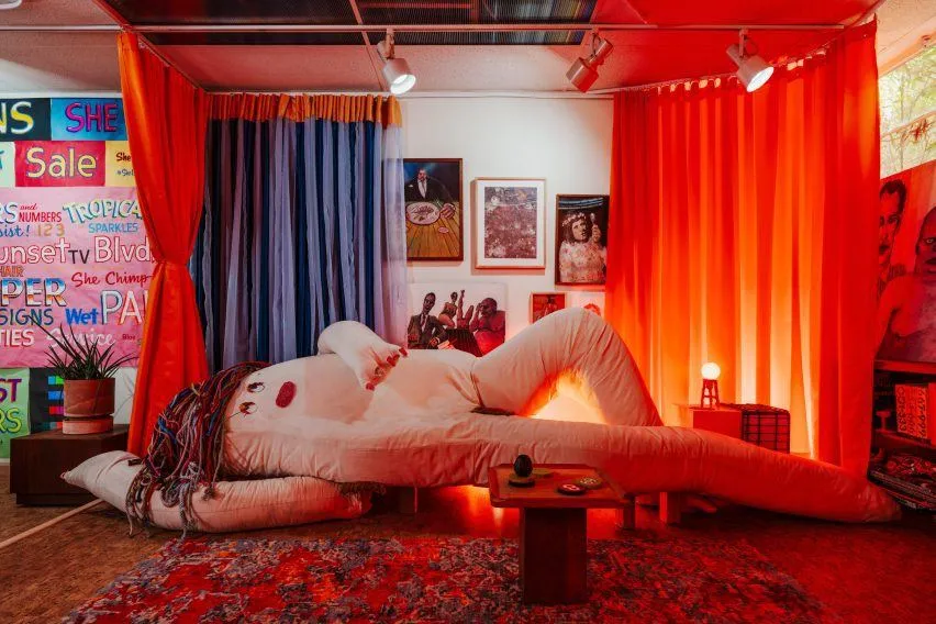 A curtain system and collectible furniture turn one LA studio into "muppets on acid", image via Dezeen