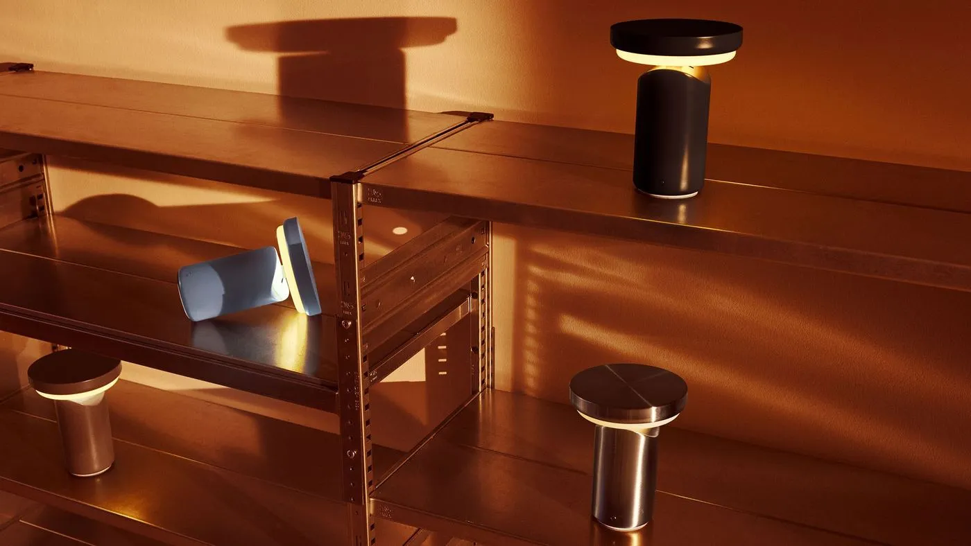 Felix Pottinger tilts a disc over a cylinder for Maytoni's Topo portable lamp, image via Dezeen